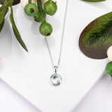 Round Charm Necklace in Silver and Blue Topaz