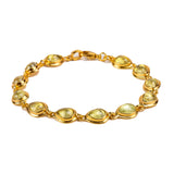 Classic Teardrop Link Bracelet in Silver with 24ct Gold & Light Blue Topaz