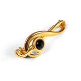Small Treble Clef Brooch in Silver with 24ct Gold and Black Onyx