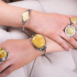 Artisan-Crafted Statement Bracelet in Silver with Milky Baltic Amber