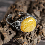 Artisan-Crafted Statement Bracelet in Silver with Milky Baltic Amber