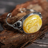 Artisan-Crafted Statement Bracelet in Silver with Milky Baltic Amber