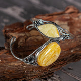 Artisan-Crafted Statement Bracelet in Silver with Milky Baltic Amber