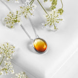 Oval Burning Amber Necklace in Silver and Amber