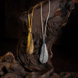 Bird Feather Necklace in Silver with 24ct Gold