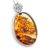 Ancient Glow, Modern Edge: Raw Baltic Amber with Natural Bark Back