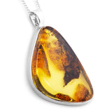 Forest Relic: Raw Natural Baltic Amber with Untouched Back in Silver