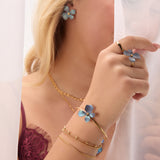 Single Flower Bangle in Silver with 24ct Gold & Blue Titanium
