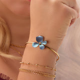 Single Flower Bangle in Silver with 24ct Gold & Blue Titanium