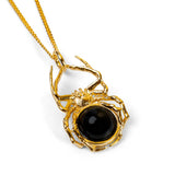 Hanging Spider Necklace in Silver and Cherry Amber