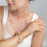 Waved Drop Earrings in Silver and Pearl