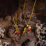 Winter Robin Necklace in Silver with 24ct Gold and Coral