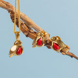 Miniature Robin Necklace in Silver with 24ct Gold and Coral
