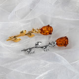 Single Stem Rose Brooch in Silver with 24ct Gold & Cognac Amber