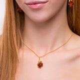 Rose Necklace in Silver with 24ct Gold and Cognac Amber