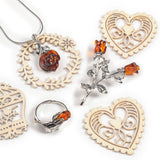 Double Rose Brooch in Silver and Cognac Amber