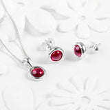Round Charm Necklace in Silver and Garnet
