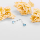 Teeny Tiny Round Stud Earrings in Silver and London Blue Topaz