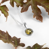 Round Charm Necklace in Silver and Green Amber