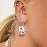 'Sun of May' Sun Face Hook Earrings in Silver