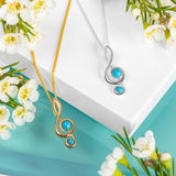 Musical Treble Clef Necklace in Silver with 24ct Gold and Turquoise