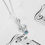 Musical Treble Clef Necklace in Silver and Blue Topaz