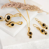 Musical Treble Clef Necklace in Silver with 24ct Gold and Black Onyx