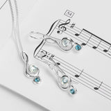 Music Treble Clef Hook Earrings in Silver and Blue Topaz