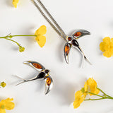 Swooping Swallow Brooch in Silver and Amber