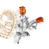 Double Rose Brooch in Silver and Cognac Amber