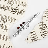 Musical Flute / Piccolo Brooch in Silver and Amber