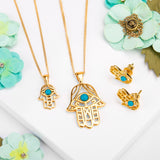 Miniature Hamsa Hand Necklace in Silver with 24ct Gold & Turquoise