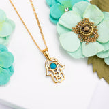 Miniature Hamsa Hand Necklace in Silver with 24ct Gold & Turquoise