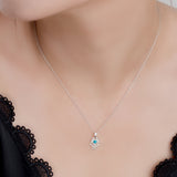 Miniature Hamsa Hand Necklace in Silver and Turquoise
