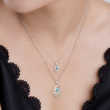Miniature Hamsa Hand Necklace in Silver and Turquoise