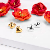 Floating Heart Stud Earrings in Silver