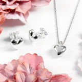 Floating Heart Stud Earrings in Silver