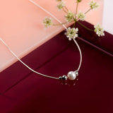 Delicate Single Stone Necklace in Silver and White Pearl