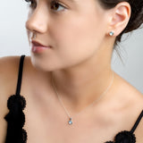 Round Charm Necklace in Silver and Blue Topaz