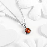 Round Charm Necklace in Silver and Cognac Amber