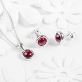 Small Round Stud Earrings in Silver and Garnet