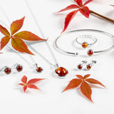 Small Round Stud Earrings in Silver and Cognac Amber