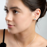 Small Round Stud Earrings in Silver and Blue Topaz