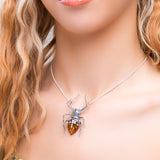 Spooky Spider Necklace in Silver and Cognac Amber