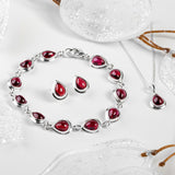Classic Teardrop Stud Earrings in Silver and Garnet