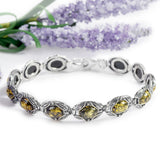 Vintage Style Link Bracelet in Silver and Green Amber